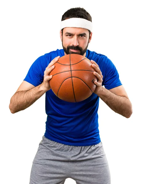 Rolig sportsman med boll av basket på isolerade vita bakgr — Stockfoto