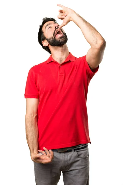 Handsome man making drunk gesture — Stock Photo, Image