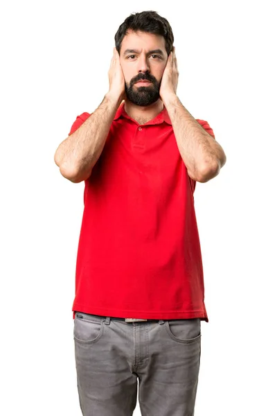 Handsome man covering his ears — Stock Photo, Image