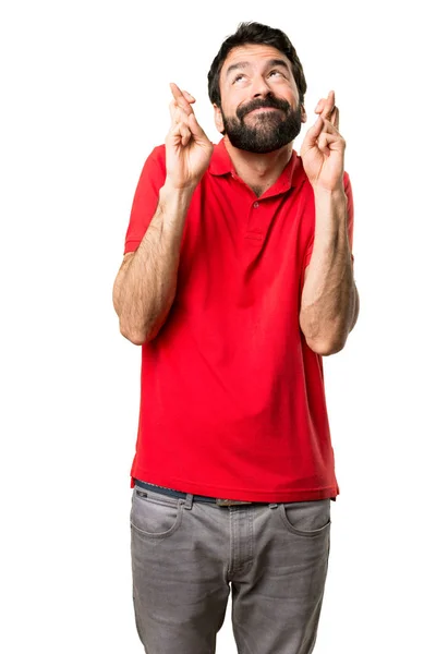 Beau homme avec les doigts croisés — Photo