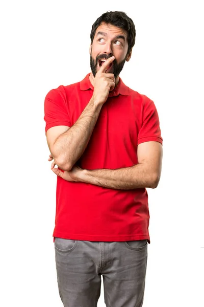 Bonito homem fazendo gesto surpresa — Fotografia de Stock