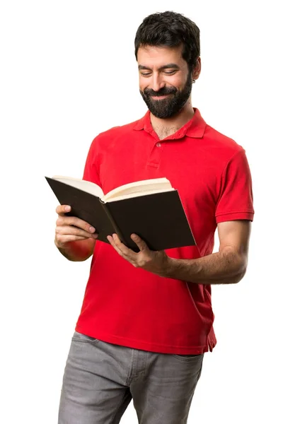 Knappe man lezen van een boek — Stockfoto