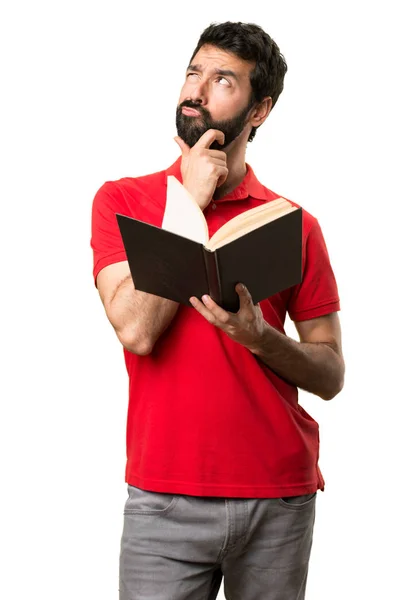 Pohledný muž s knihou — Stock fotografie
