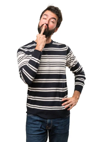 Man with beard making horn gesture — Stock Photo, Image