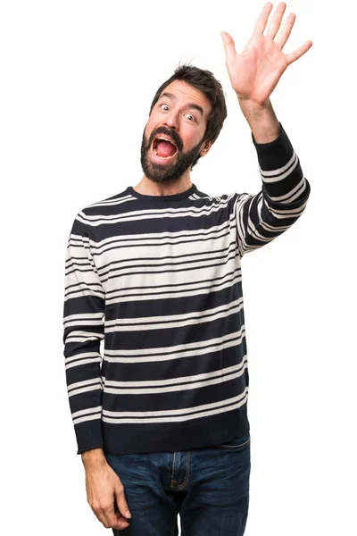 Man with beard saluting — Stock Photo, Image