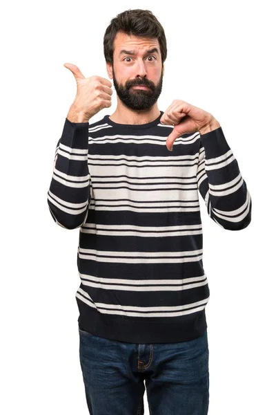 Man with beard making good-bad sign — Stock Photo, Image