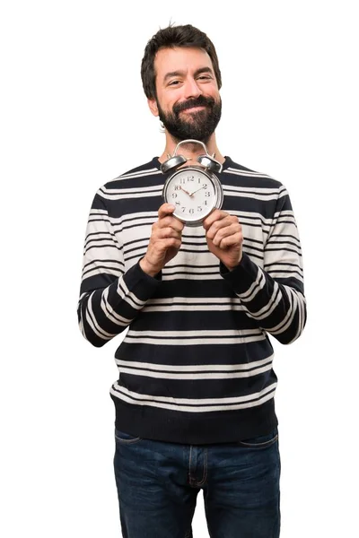Gelukkig Man met baard die houdt van vintage klok — Stockfoto