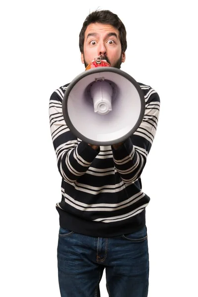 Hombre con barba sosteniendo un megáfono — Foto de Stock