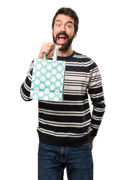 Gelukkig Man met baard met boodschappentas — Stockfoto