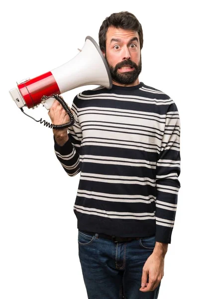 Hombre con barba sosteniendo un megáfono —  Fotos de Stock