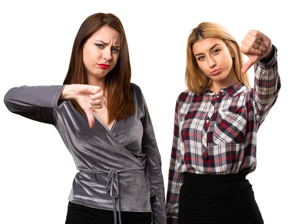 Two friends making bad signal — Stock Photo, Image