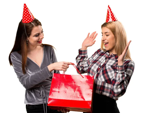 Two friends holding a gift — Stock Photo, Image