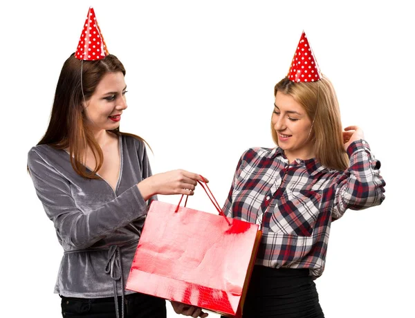 Two friends holding a gift — Stock Photo, Image