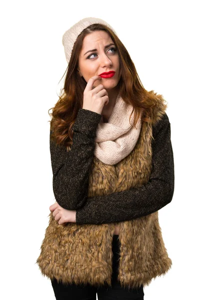 Menina com roupas de inverno pensando — Fotografia de Stock