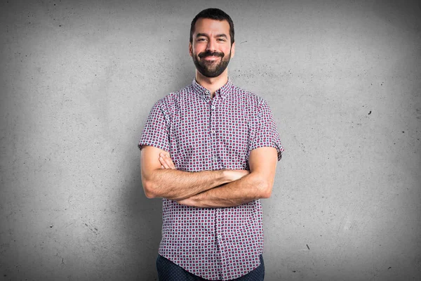 Handsome man with his arms crossed — Stock Photo, Image