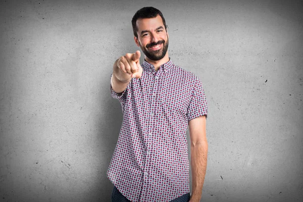 Handsome man pointing to the front — Stock Photo, Image