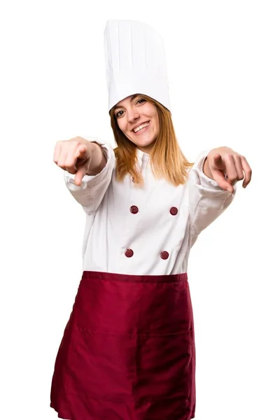 Prachtige chef-kok woman wijzend op de voorgrond plaatsen — Stockfoto