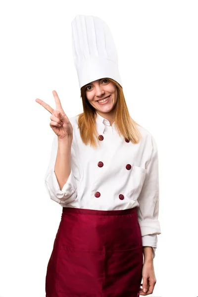 Hermosa mujer chef haciendo gesto de victoria — Foto de Stock