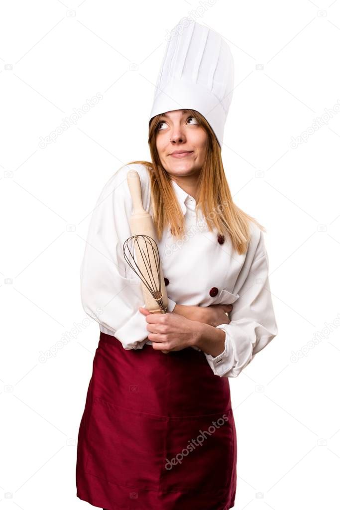 Beautiful chef woman making unimportant gesture