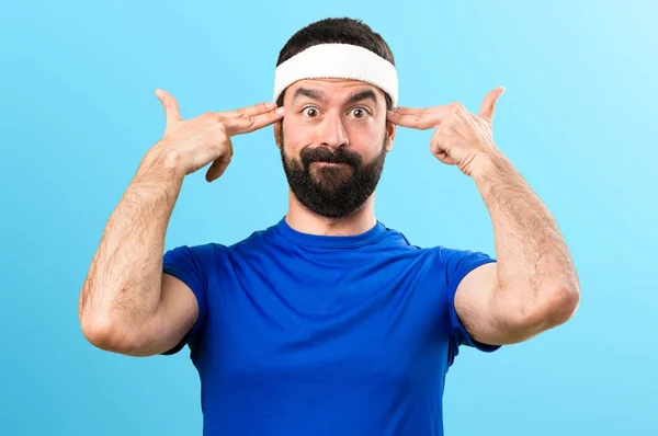 Funny sportsman making suicide gesture on colorful background — Stock Photo, Image