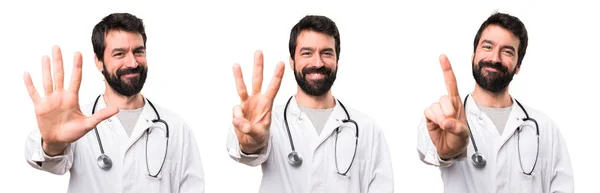 Set of Young doctor counting five, three and one — Stock Photo, Image