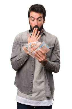 Sakallı üzerine beyaz bir sürü para alarak sürpriz yakışıklı adam