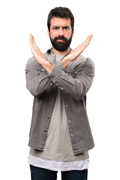 Stilig man med skägg gör ingen gest på vit bakgrund — Stockfoto