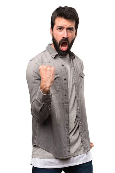 Gelukkig knap man met baard op witte achtergrond — Stockfoto