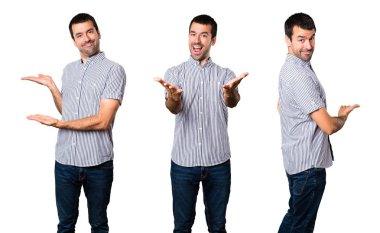 Yakışıklı adam bir şey sunmak kümesi