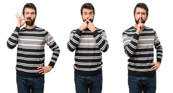 Mann mit Bart macht Schweigegegeste — Stockfoto