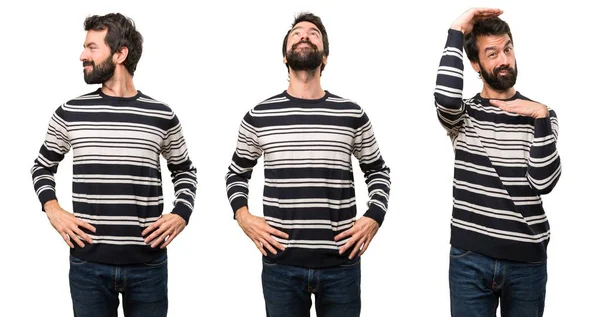 Conjunto de Homem com barba olhando para cima, lateral e frontal — Fotografia de Stock