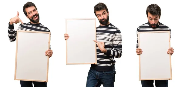 Conjunto de Homem com barba segurando um cartaz vazio — Fotografia de Stock