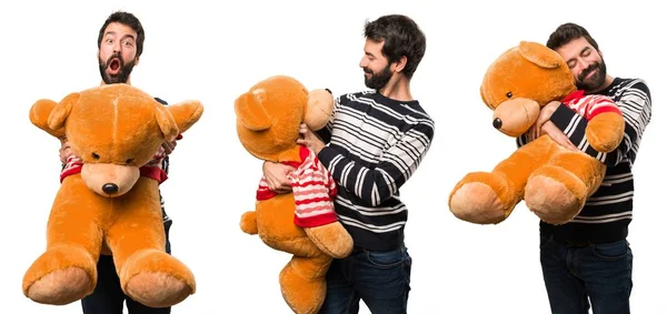 Set de hombre con barba jugando con peluche —  Fotos de Stock