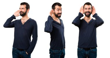 Bir şey dinlerken sakallı yakışıklı adam kümesi