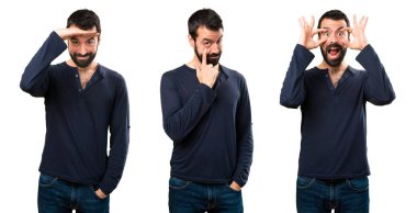 Bir şeyler gösteriyor sakallı yakışıklı adam kümesi