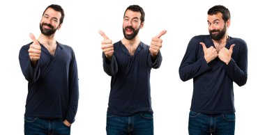 Başparmak ile sakallı yakışıklı adamın ayarla