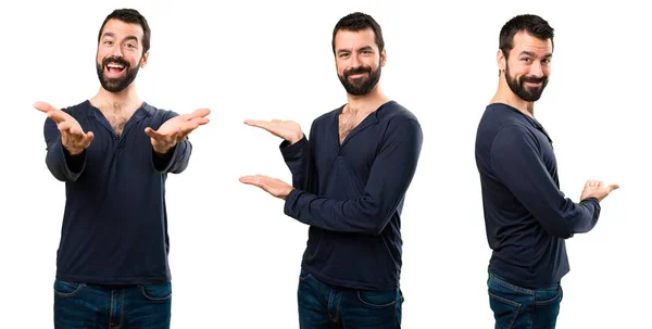 Set of Handsome man with beard presenting something — Stock Photo, Image