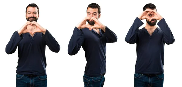 Set van knappe man met baard maken een hart met zijn handen — Stockfoto