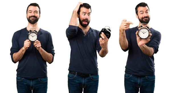 Conjunto de homem bonito com barba segurando relógio vintage — Fotografia de Stock