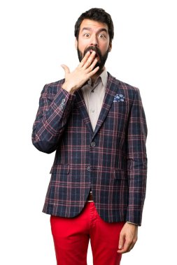 İyi giyimli adam yapma sürpriz jest beyaz arka plan üzerinde