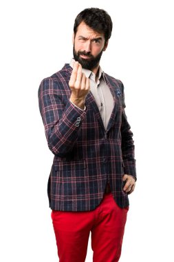 İyi giyimli adam yapma para hareketi beyaz arka plan üzerinde