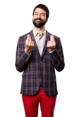 İyi giyimli adam yapma para hareketi beyaz arka plan üzerinde