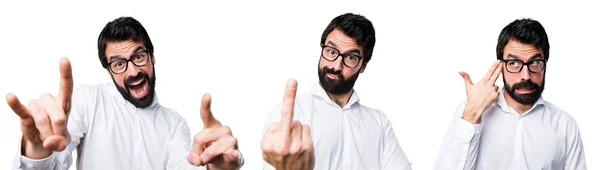 Hombre guapo con gafas haciendo gesto de cuerno — Foto de Stock