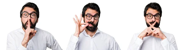 Hombre guapo con gafas haciendo gesto de silencio — Foto de Stock