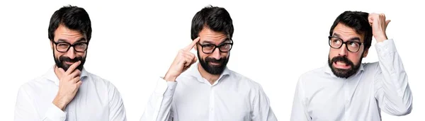Przystojny mężczyzna w okularach myślenia — Zdjęcie stockowe