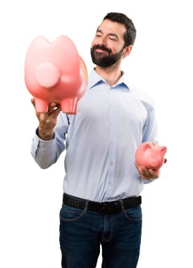 Sakallı bir servet tutan mutlu yakışıklı adam