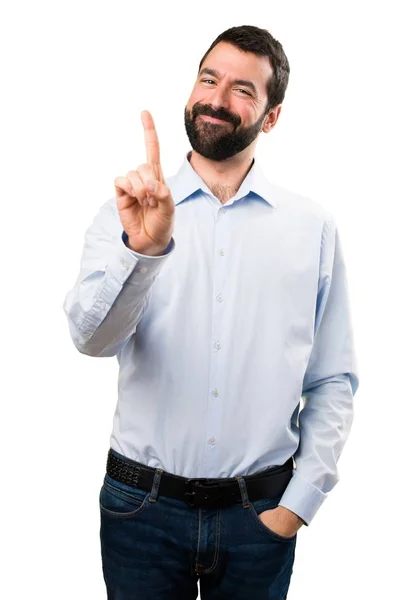 Bonito homem com barba contando um — Fotografia de Stock