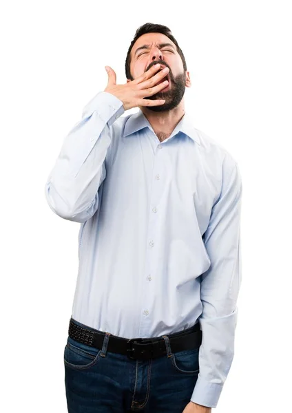 Handsome man with beard yawning — Stock Photo, Image