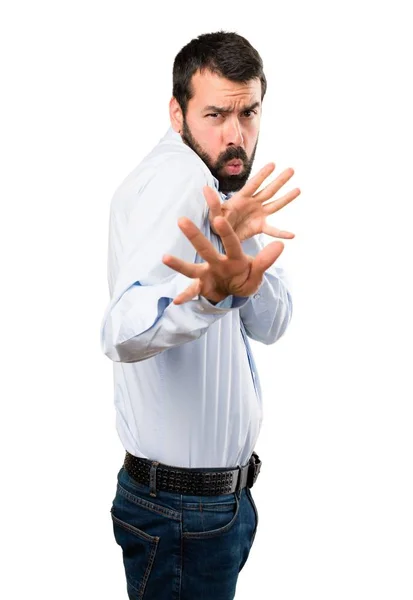 Homem bonito com barba fazendo nenhum gesto — Fotografia de Stock