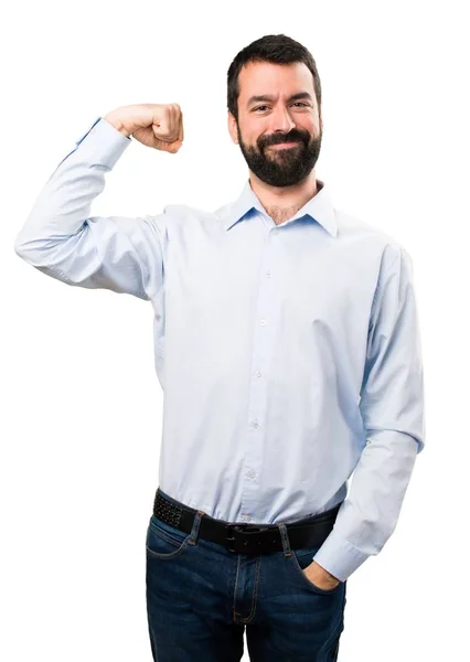 Beau homme avec barbe faisant un geste fort — Photo